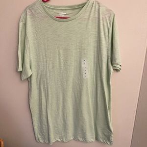 mint green shirt